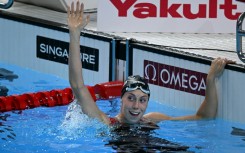Gretchen Walsh completed a 50m-100m butterfly double at swimming's world championships in Singapore