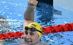 Australia's swimmer Cameron McEvoy celebrates winning the final of the men's 50m freestyle