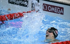 Katie Ledecky won 800m freestyle gold at the world championships in Singapore on Saturday