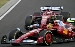 Ferrari's Lewis Hamilton (foreground) and teammate Charles Leclerc during practice at the Hungaroring