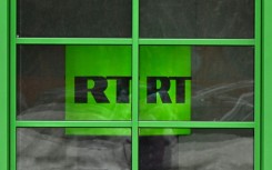 A photograph taken in Moscow in January 2023 shows the logo of RT (Russia Today) TV channel displayed at the company headquarters