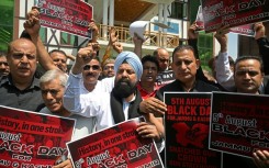 Protesters in Srinagar call for the restoration of state-hood for Kashmir, which has been under direct rule from New Delhi for six years