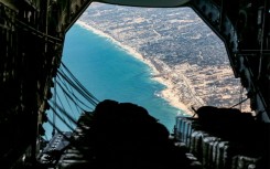 A German Air Force plane releasing humanitarian aid over the Gaza Strip on August 5, 2025