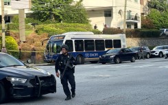 A gunman killed a police officer Friday near the headquarters of the Centers for Disease Control in the US city of Atlanta before being found dead at the scene, authorities said