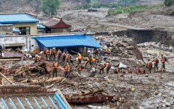 The death toll from flash floods and mudslides in China's northwestern Gansu has risen to 13, with 30 people missing, state media said