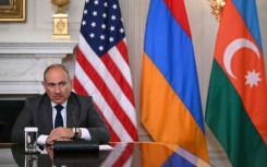Armenian Prime Minister Nikol Pashinyan looks on during a trilateral signing with US President Donald Trump and Azerbaijani President Ilham Aliyev in the State Dining Room of the White House in Washington, DC on August 8, 2025