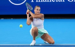 Aryna Sabalenka gets low for a backhand on the way to an opening victory over Marketa Vondrousova at the ATP-WTA Cincinnati Open