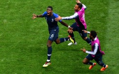 Paul Pogba celebrates scoring in the 2018 World Cup final in Moscow on July 15, 2018