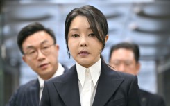 South Korea's former first lady Kim Keon Hee, wife of impeached former president Yoon Suk Yeol, arrives for a hearing at the Seoul Central District Court on August 12