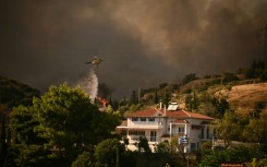 Firefighters in Patras were facing 'scattered' pockets but the fire was 'still active' in the eastern outskirts of the city