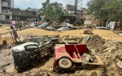 Most were killed in flash floods and collapsing houses