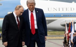 US President Donald Trump (R) has expressed admiration for Russian counterpart Vladimir Putin in the past, but has shown impatience with him in recent months
