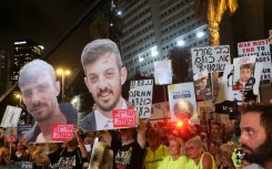 People attend a demonstration in Tel Aviv organised by families and friends of Israelis held hostage by Palestinian militants in the Gaza Strip