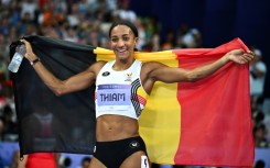 Belgium's Nafissatou Thiam celebrates after winning the Paris Olympics heptathlon