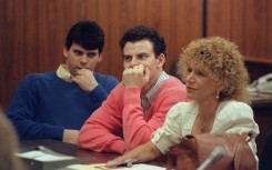 Erik Menendez (C) and his brother Lyle are seeking parole more than 35 years after they killed their parents at the family's luxury Beverly Hills home