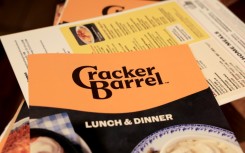 The new, simplified logo features just a simplified text of the brand name in a rounded-off yellow hexagon