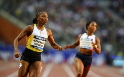 US sprinter Melissa Jefferson-Wooden (L) wins the 100m at the Brussels Diamond League