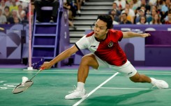 Indonesia's Anthony Ginting in action against France's Toma Junior Popov at the Paris 2024 Olympic Games