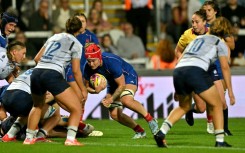 France flanker Charlotte Escudero runs in to score a try during a 24-0 Women's Rugby World Cup Pool D win over Italy in Exeter