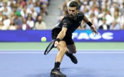 Novak Djokovic opened his US Open campaign with a straight sets win over Learner Tien as he chases a record 25th Grand Slam singles title