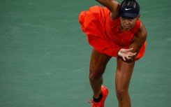 Japan's Naomi Osaka serves during her win over Belgium's Greet Minnen