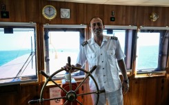 Ekrem Ozcelik captains the Pasabahce ferry, the flagship of operator Sehir Hatlari's 30 vessels