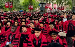 Graduates gather as they attend commencement ceremony at Harvard University in Cambridge, Massachusetts, on May 29, 2025