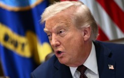 US President Donald Trump's move to close a duty-free exemption for small parcels has sparked confusion among postal service providers