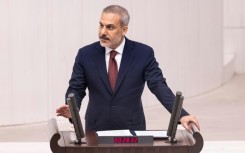 Turkish Foreign Minister Hakan Fidan addresses parliament during a special session on Gaza