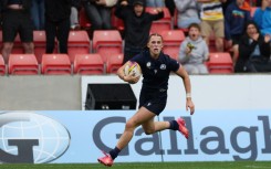 Scotland centre Emma Orr scores their fifth try during a 29-15 Women’s Rugby World Cup Pool B win over Fiji at Salford
