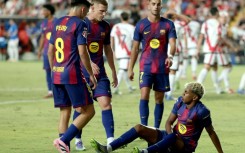 Barcelona's Spanish forward Lamine Yamal won and scored a penalty but his team were held to a draw by Rayo Vallecano on Sunday