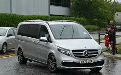 A vehicle believed to be carrying Sweden striker Alexander Isak arrives at Liverpool's training ground