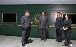 This picture taken on September 1, 2025 and released from North Korea's official Korean Central News Agency via KNS shows Kim outside his train
