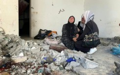 Palestinians mourn relatives killed in strike on Gaza City