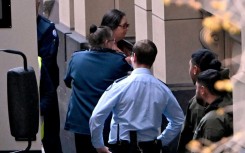 Convicted murderer Erin Patterson (top, C) arrives at the Supreme Court of Victoria in Melbourne on September 8, 2025
