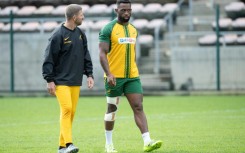 South Africa's Siya Kolisi with his leg in heavy strapping last month in Cape Town
