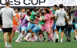 Players of Seattle Sounders and Inter Miami CF fight after the Sounders' victory in the Leagues Cup final