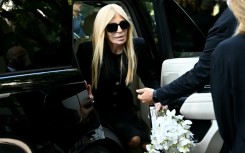 Italian fashion designer Donatella Versace arrives at the Armani Theatre where late Italian fashion designer Giorgio Armani lies-in state, in Milan on September 6, 2025.