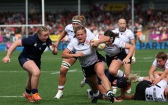 Canada hooker Emily Tuttosi runs in a try during a 40-19 Women's Rugby World Cup Pool B win over Scotland in Exeter