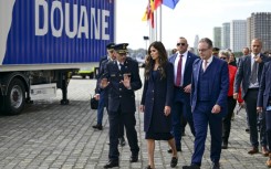 Belgian Prime Minister Bart De Wever, right, at the port of Antwerp with US Homeland Security Secretary Kristi Noem