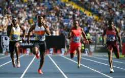 Jamaican athletics legend Usain Bolt fancies his compatriots including Olympic silver medallist Kishane Thompson (2L) can beat defending world champion Noah Lyles in the 100 metres