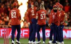 England's Jofra Archer (C) celebrates dismissing South Africa's Marco Jansen during the second T20 at Old Trafford