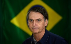 Brazil's right-wing former leader Jair Bolsonaro will not head to prison -- for now