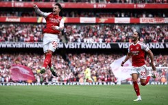 Arsenal's Martin Zubimendi (L) celebrates scoring against Nottingham Forest