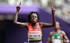 Kenya's Peres Jepchirchir celebrates winning the women's marathon at the world championships in Tokyo
