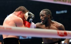 Terence Crawford lands a right on Canelo Alvarez on the way to victory in their undisputed super middleweight world title fight in Las Vegas