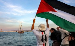 Activists see off boats in the Gaza aid flotilla departing from Tunisia's northern port of Bizerte on September 14, 2025