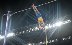 Armand Duplantis clears the bar to set a new world record of 6.30 metres at the third attempt