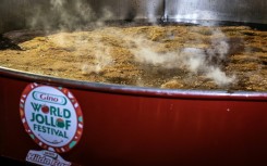 A giant pot containing almost nine tonnes of jollof rice has earned Nigerian chef Hilda Baci a world record