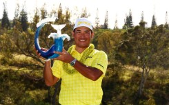 Japan's Hideki Matsuyama holds the trophy from winning the 2025 Sentry title, but the PGA Tour announced drought conditions mean the Plantation Course at Kapalua will not host the traditional season-opening event next January